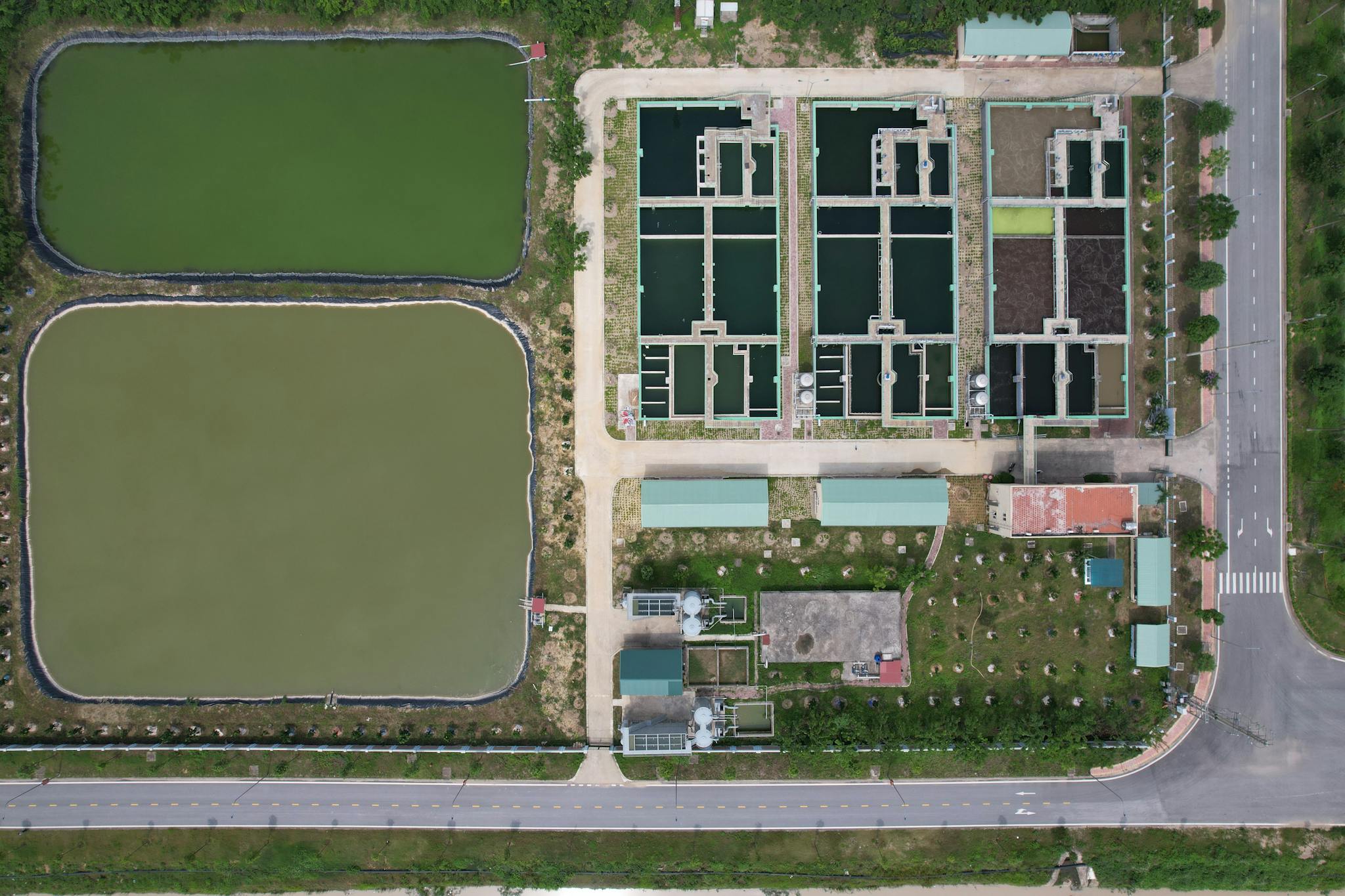 Aerial view of a water treatment facility and ponds in Hiệp Hòa, Bac Giang, Vietnam.